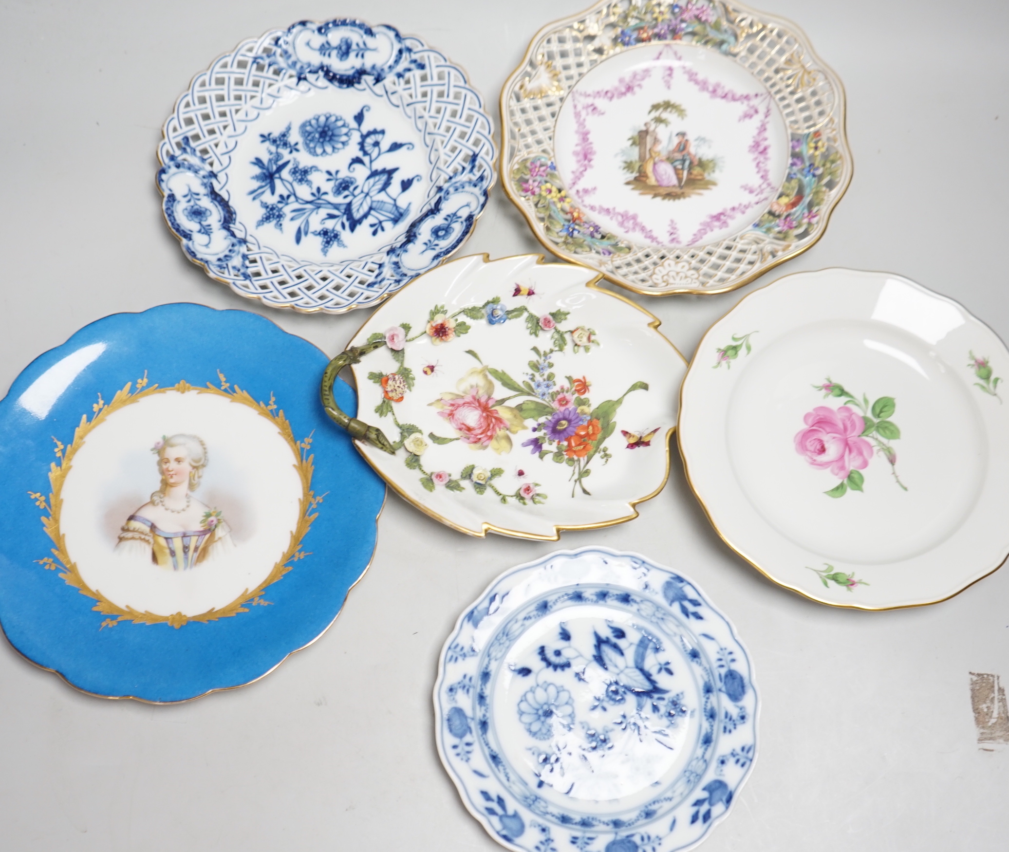 Six Continental plates by Meissen, Dresden, Sevres, etc. including Sevres Comtesse Dubarry portrait, two Meissen plates with pierced edges, two outside decorated, widest 23.5cm